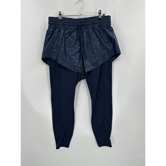 Athleta Rainier 2 in 1 Tight in Navy Blue side pockets Size Medium - Picture 3 of 7